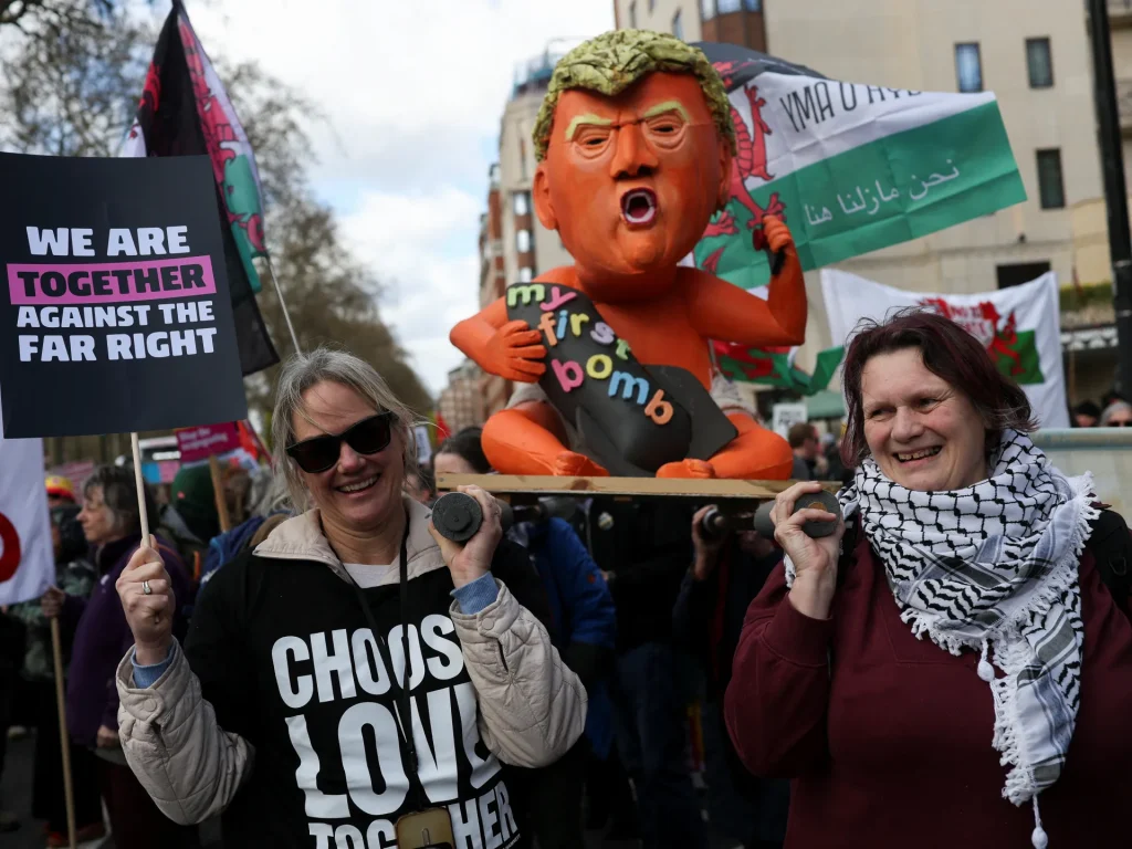 Hundreds of thousands of people marched in London, standing up against the far right. protest news