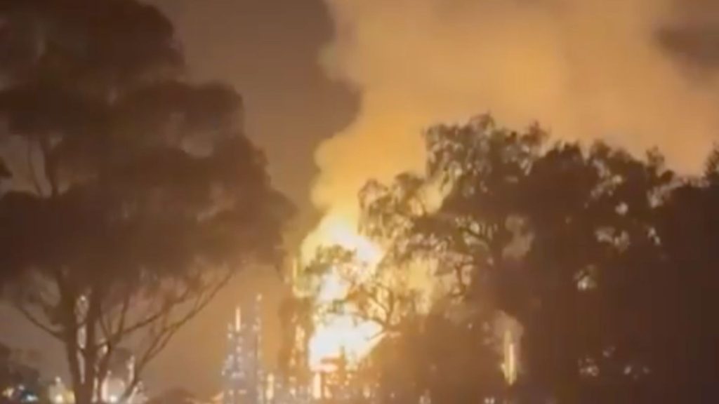 A massive fire broke out at an oil refinery, smoke and flames were seen from miles away, with residents told to stay away and keep windows closed