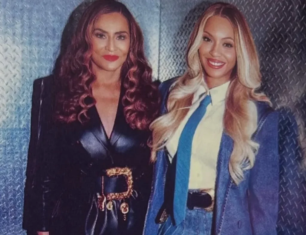 Beyonce in blue denim Romeo Hunte with Tina Knowles at the Super Bowl