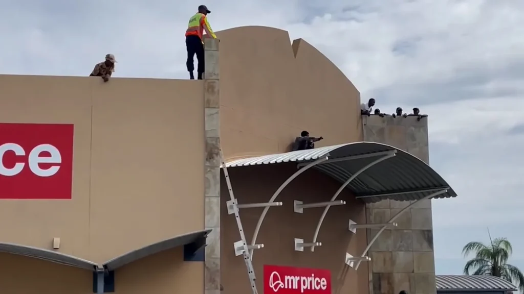 Escaped prisoner hiding on rooftop of shopping center in Namibia. Al Jazeera