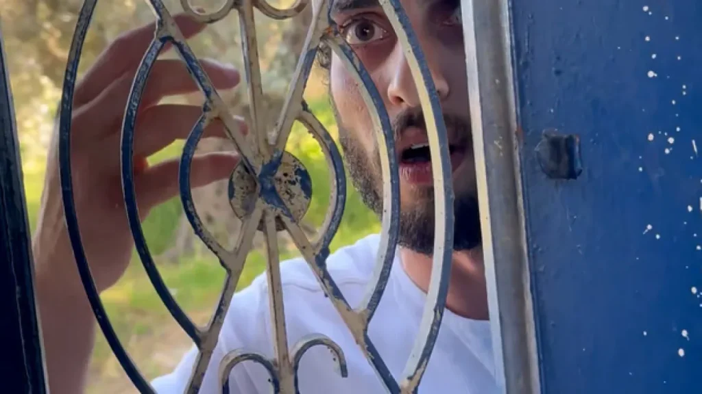 Israeli settler attacks Hebron activist's home while soldiers watch. occupied the west bank