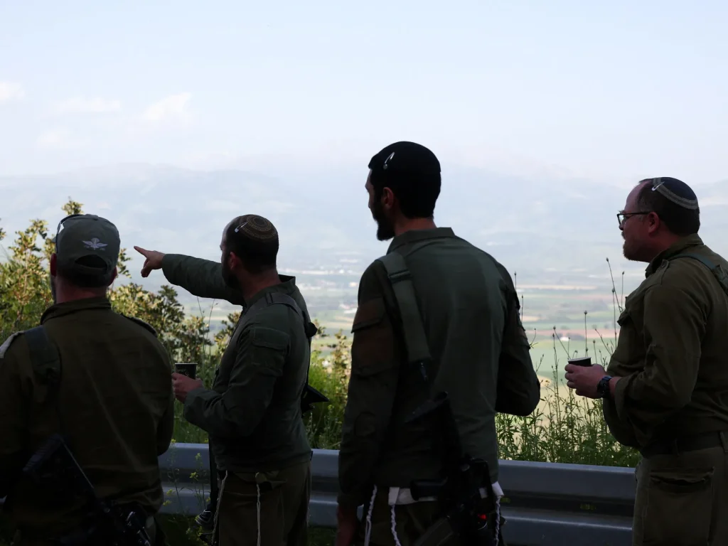 Outrage in Lebanon after picture shown of Israeli soldier demolishing Jesus statue. Israel attacks Lebanon News