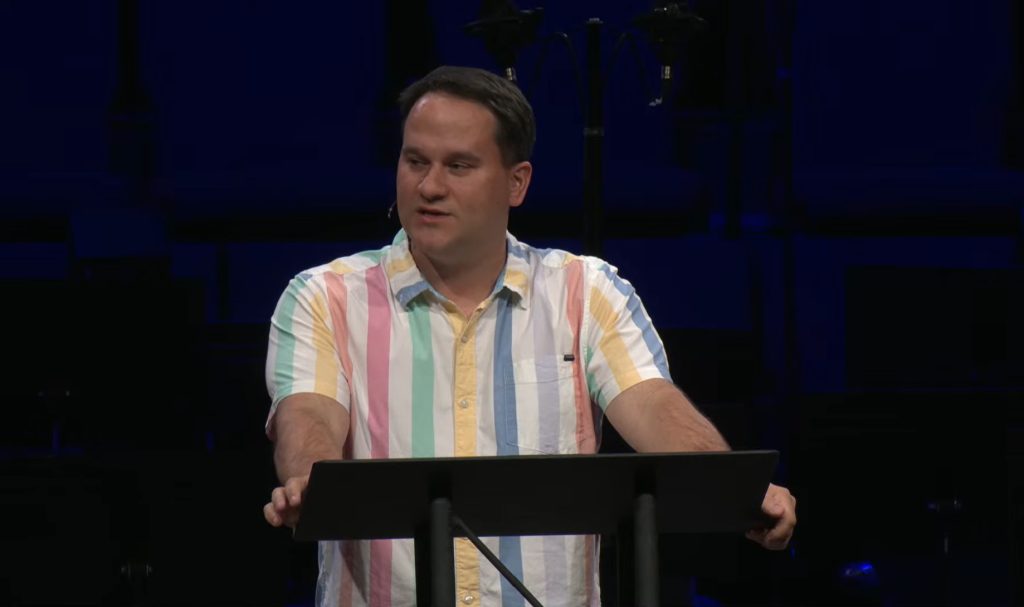 Pastor warns congregation against 'gossip' after academy band director's arrest