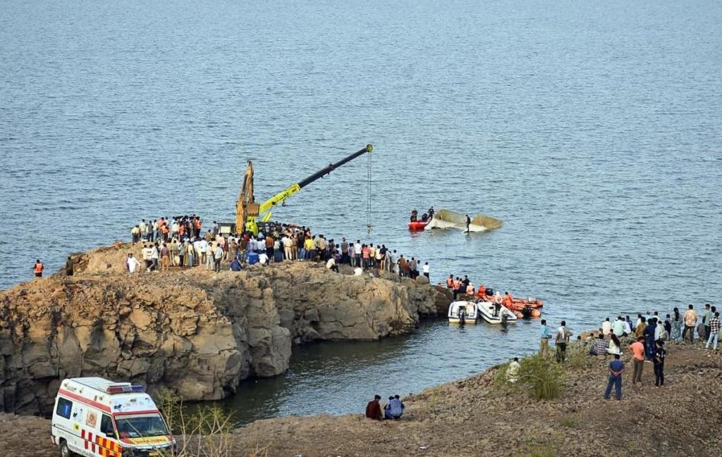At least nine people, including a mother and son, died and six went missing after a tourist boat capsized during the storm.