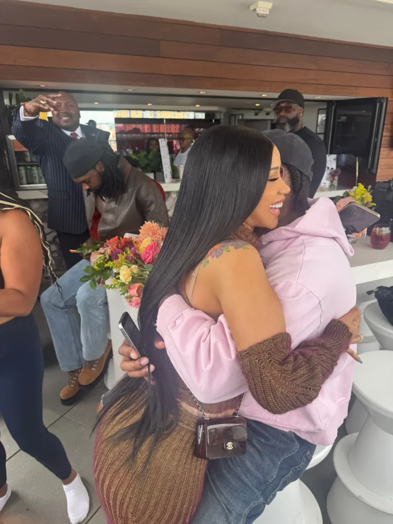 Cardi B wore a brown Vivienne Westwood knit set to the Diggs Deep Foundation Wellness Event with Stefon Diggs.