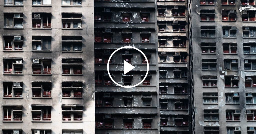 Hong Kong residents return to burnt homes