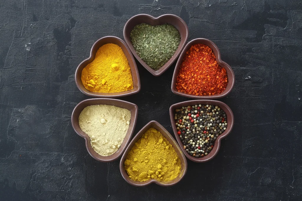 How do everyday spices help protect the heart?