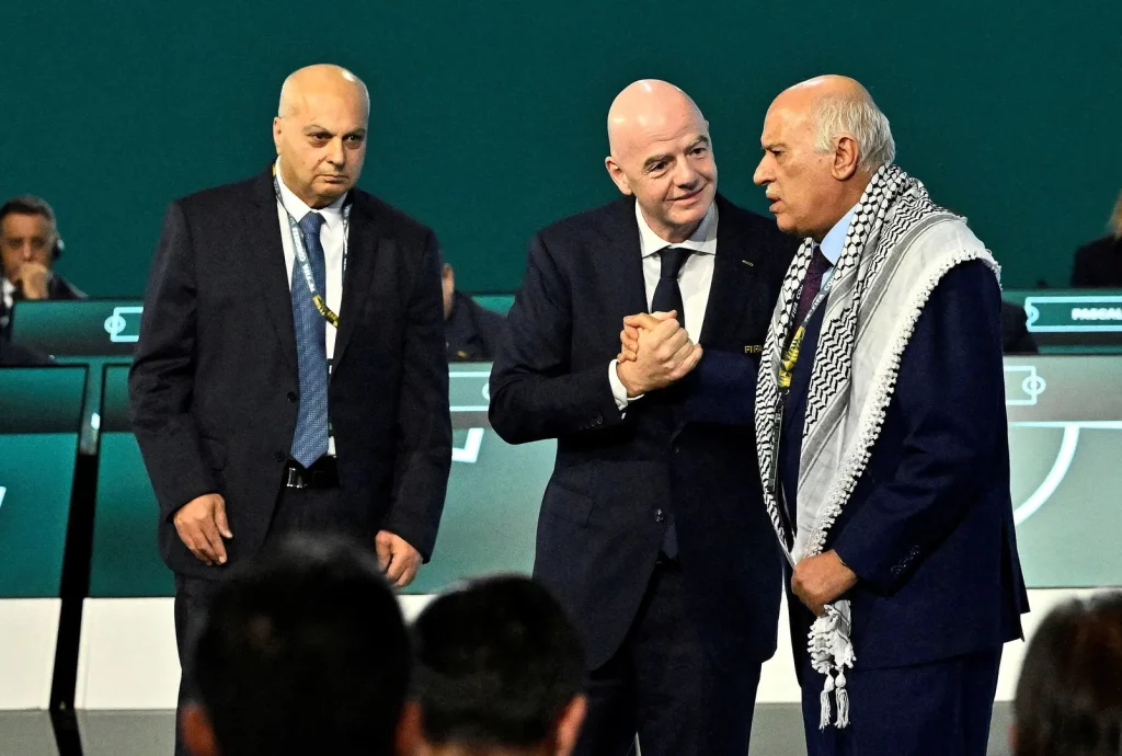 Palestinian football boss refuses to shake Israeli's hand at FIFA event Israel-Palestine conflict
