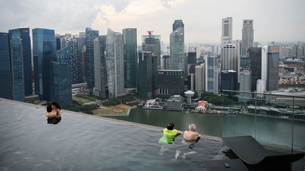 Singapore expects arrivals to increase, but spending to decline
