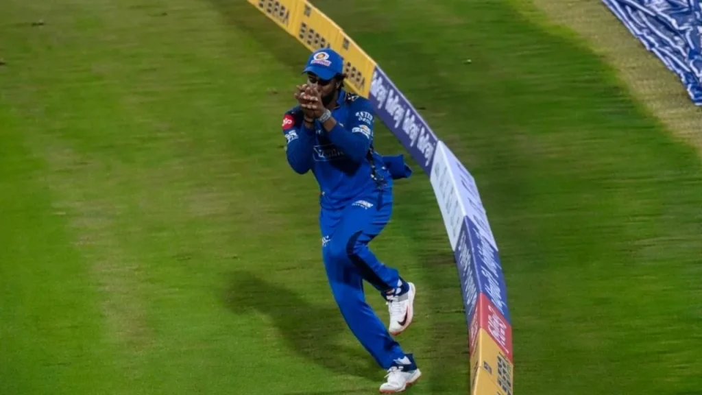 Tilak Verma takes a sensational catch to dismiss Krunal Pandya in RCB vs MI clash