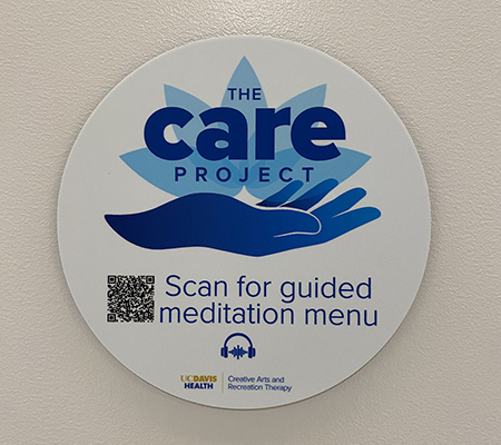 CARE Project mediation signs mounted on wall inside the hospital