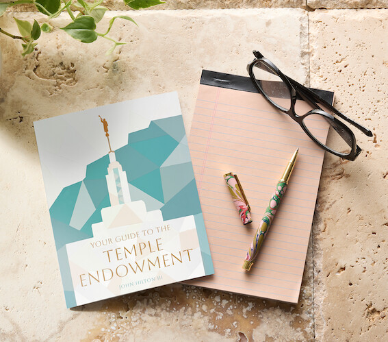 Your Guide to the Temple Endowment with a notebook
