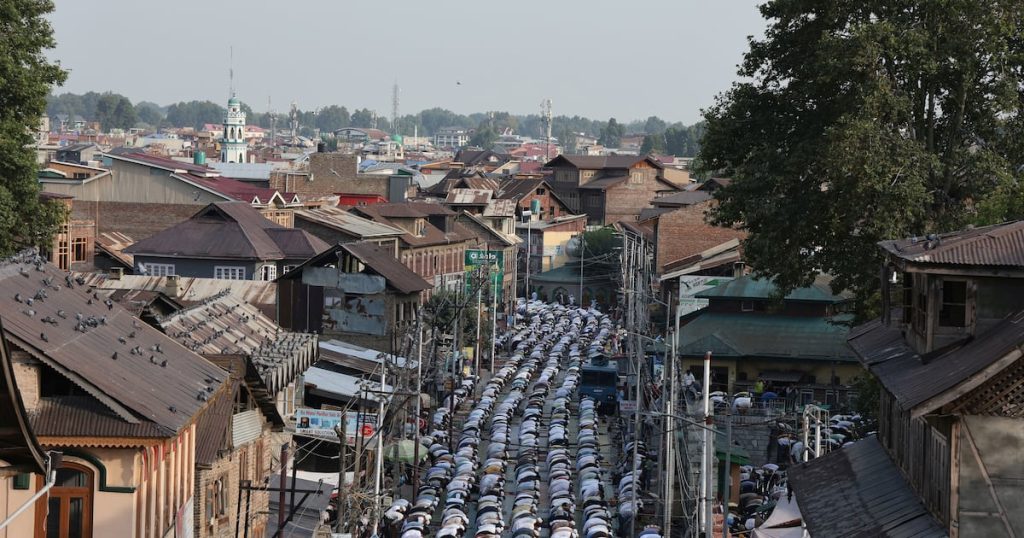 Best photos of August 18: Prayers in Srinagar to football with a difference in Colombia